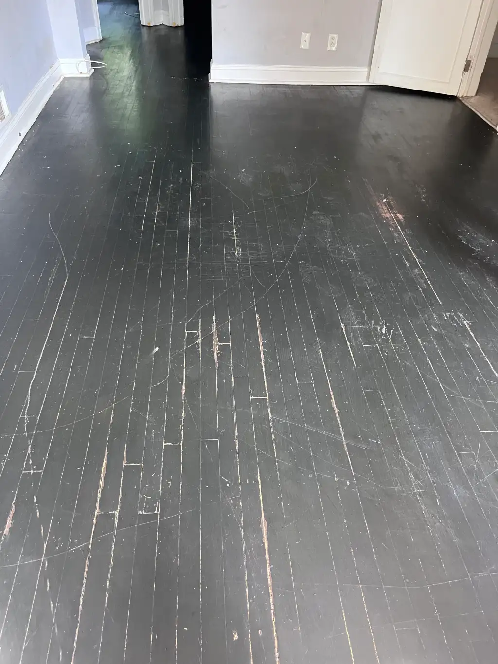 Old flooring before residential flooring renovation