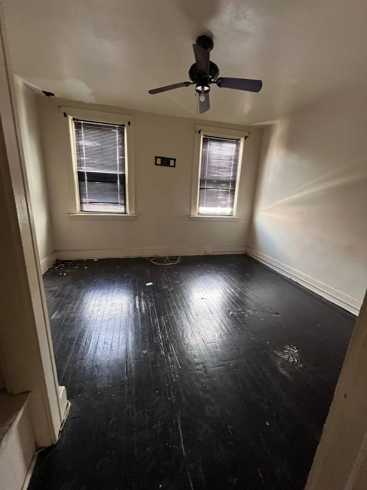 Homestead Flooring Front Bedroom Before